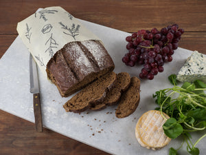 Honeywrap - Reusable Food Wrap. Wildflower Design Wrapping Bread.